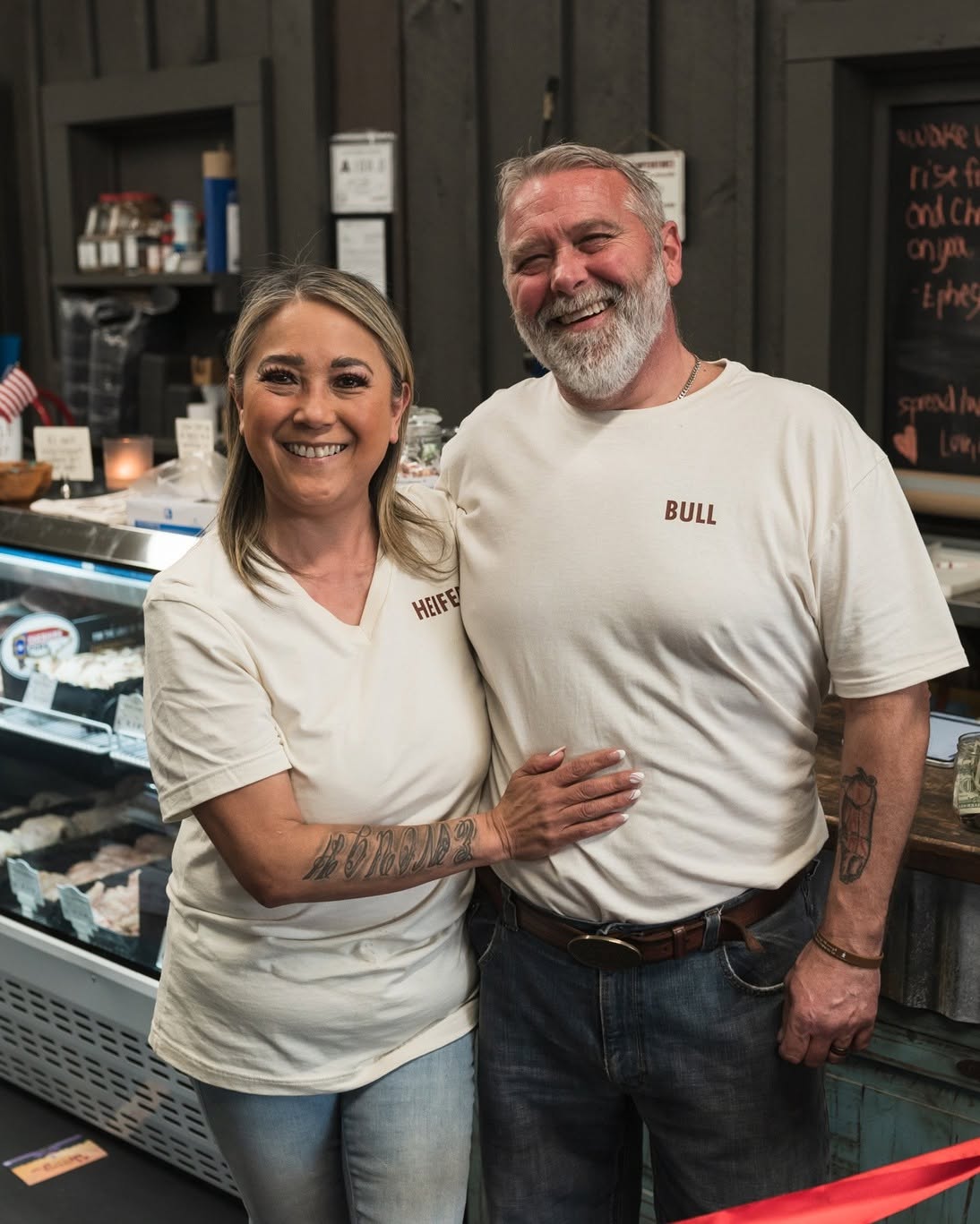 A portrait of the two people behind Heifer & Bull Butchery, smiling together